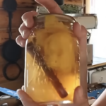 A jar of pickled peaches.